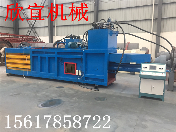 120型多功能卧室废纸箱打包机 易拉罐打包机 秸秆玉米打包机车间一角
