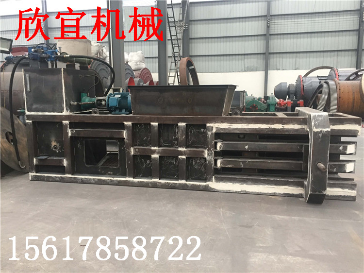 120型多功能卧室废纸箱打包机 易拉罐打包机 秸秆玉米打包机车间一角